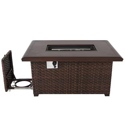 Brown wicker fire pit table with glass top on a white background