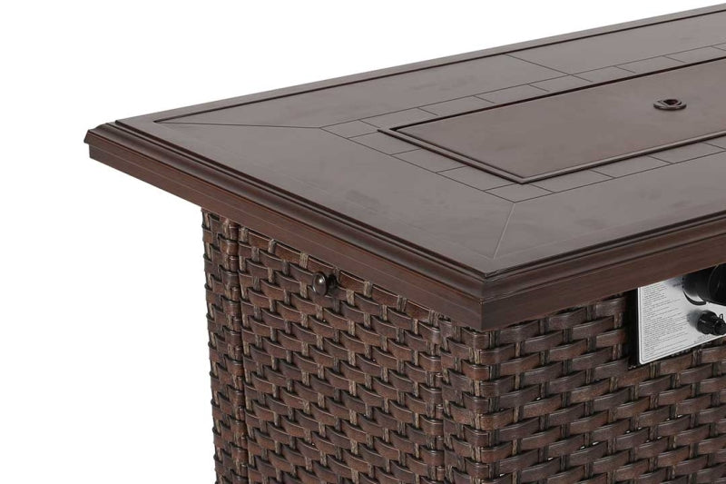 Brown wicker outdoor table with a fire pit on a white background