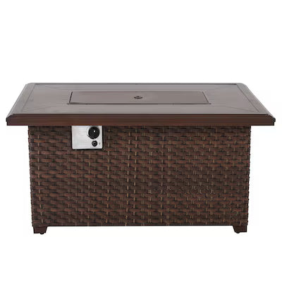 Brown wicker fire pit table with a glass top on a white background